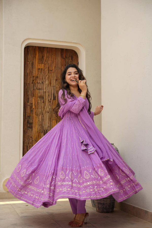 Purple Anarkali suit set.